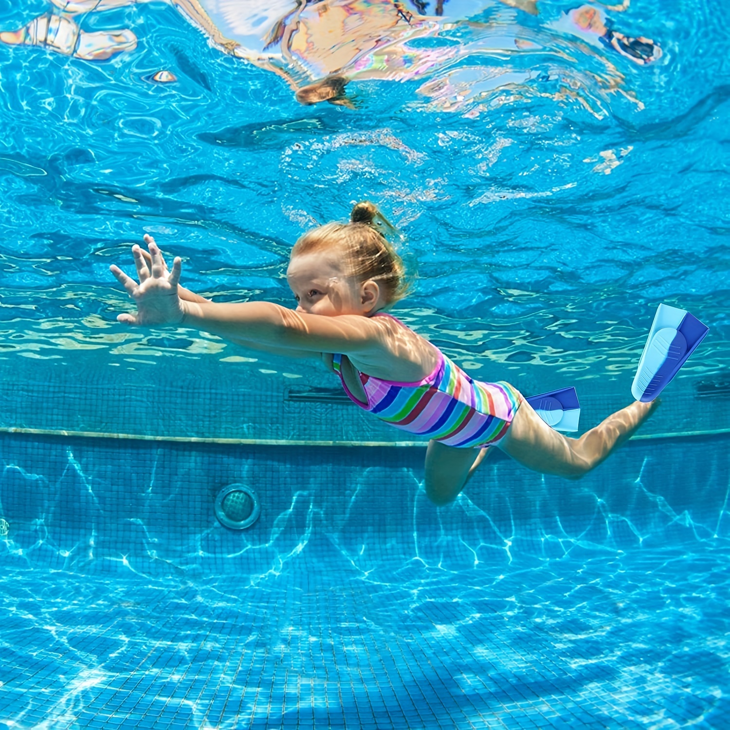El uso de aletas en la piscina para mejorar la técnica