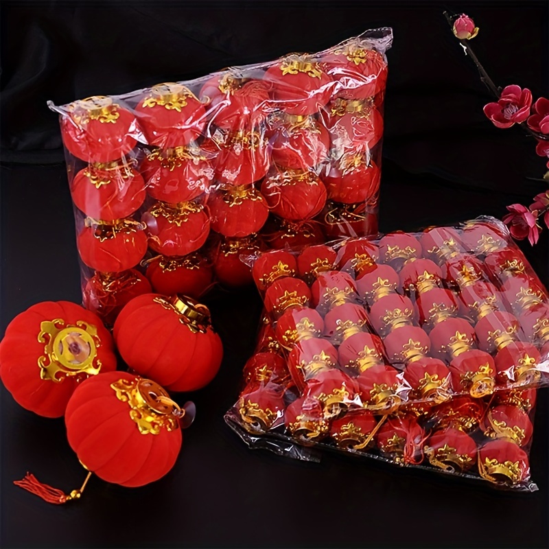 Premium Photo | A bunch of red chinese lanterns are hanging from a string