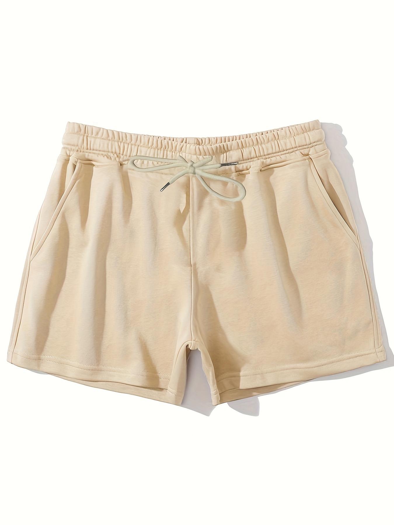 COS - The beige linen shorts: a warm-weather classic.
