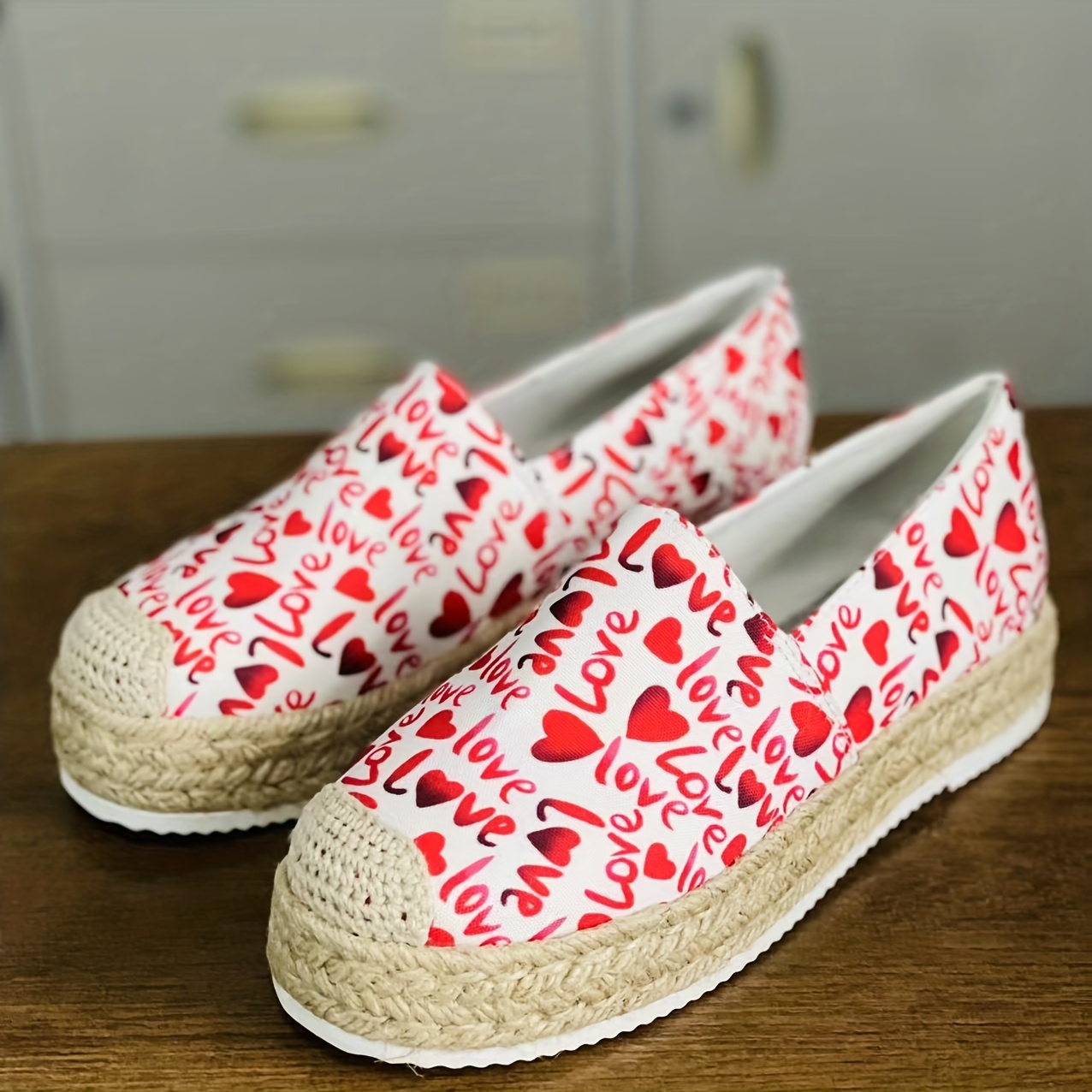 Love Moschino platform sneakers with heart motif in white