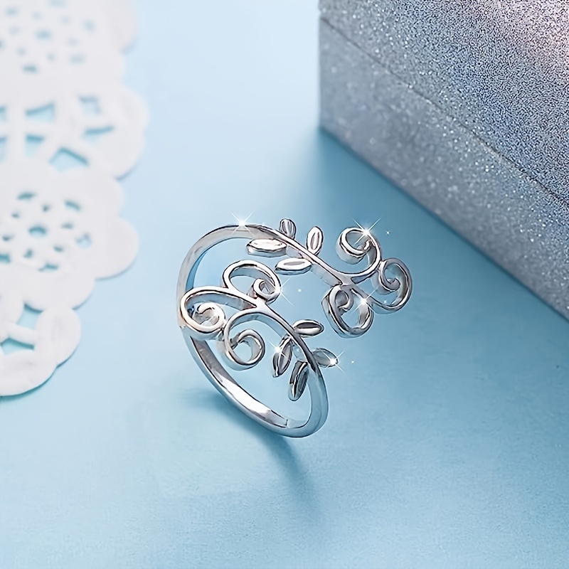 Adjustable Open Leaf Ring with Intricate Filigree Details