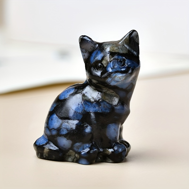 Sculpture de chat en position assise en pierre de taille