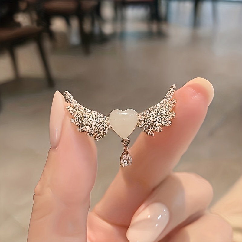 Angel hot sale wing brooch