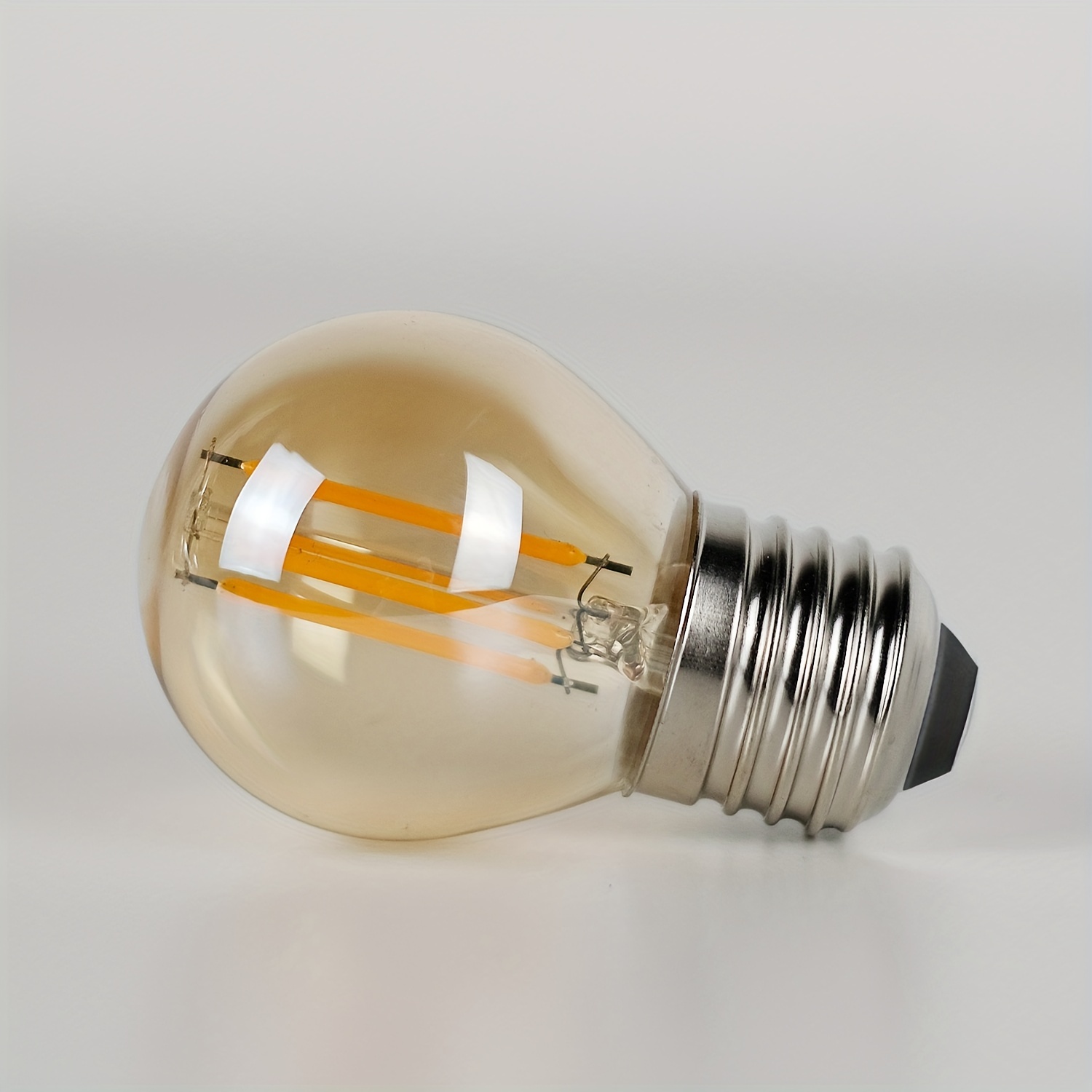 BES-27526 - Lampadine e Adattatori - beselettronica - Lampadina led E27  irregolare 4W vintage filamento vetro ambrato luce calda 03