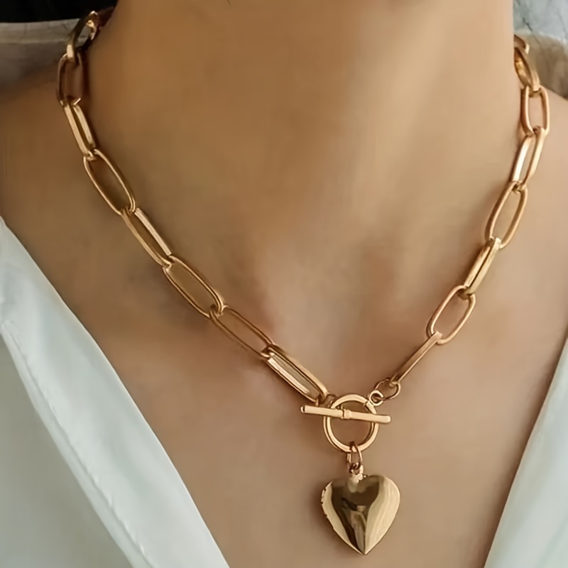 

Collier Pendentif Cœur Doré Tendance pour Femme 1pc - Design & Simple avec Chaîne Trombone, en Fer, pour Tenue Décontractée