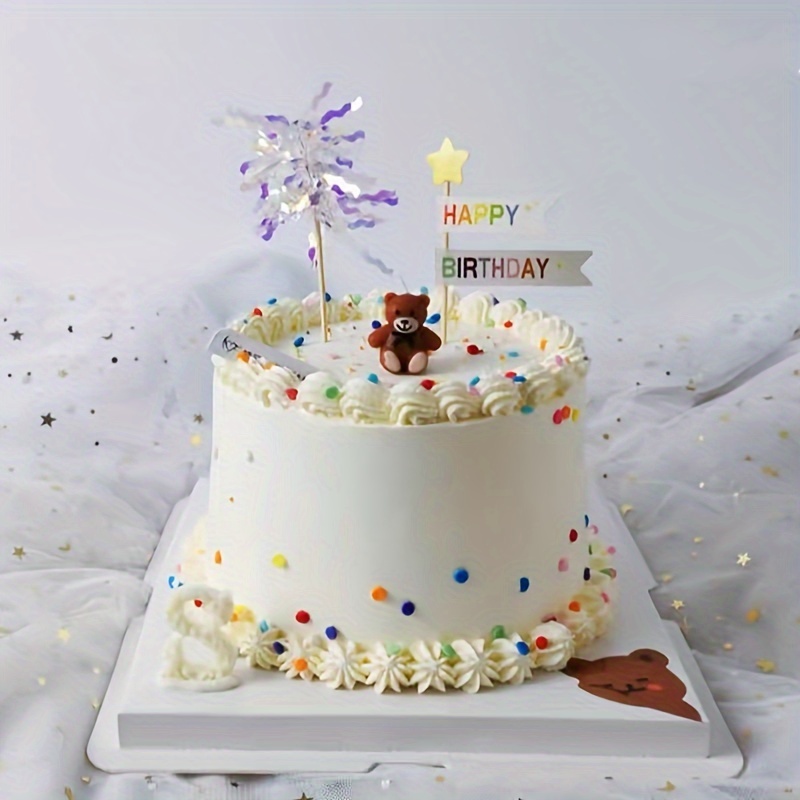 Dibujos animados bebé sosteniendo pastel de cumpleaños un año