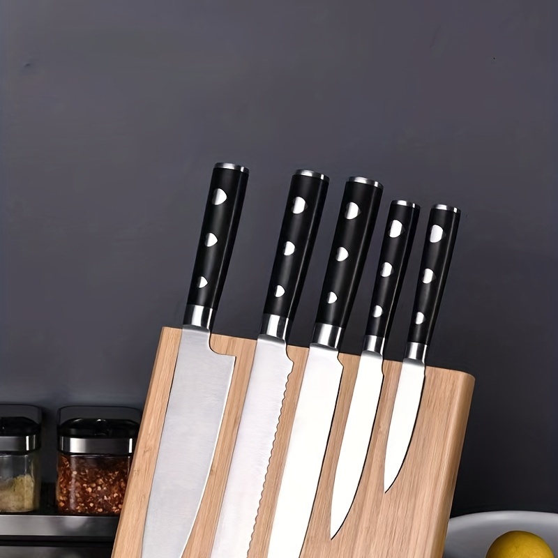 Magnetic knife strip with sharpener