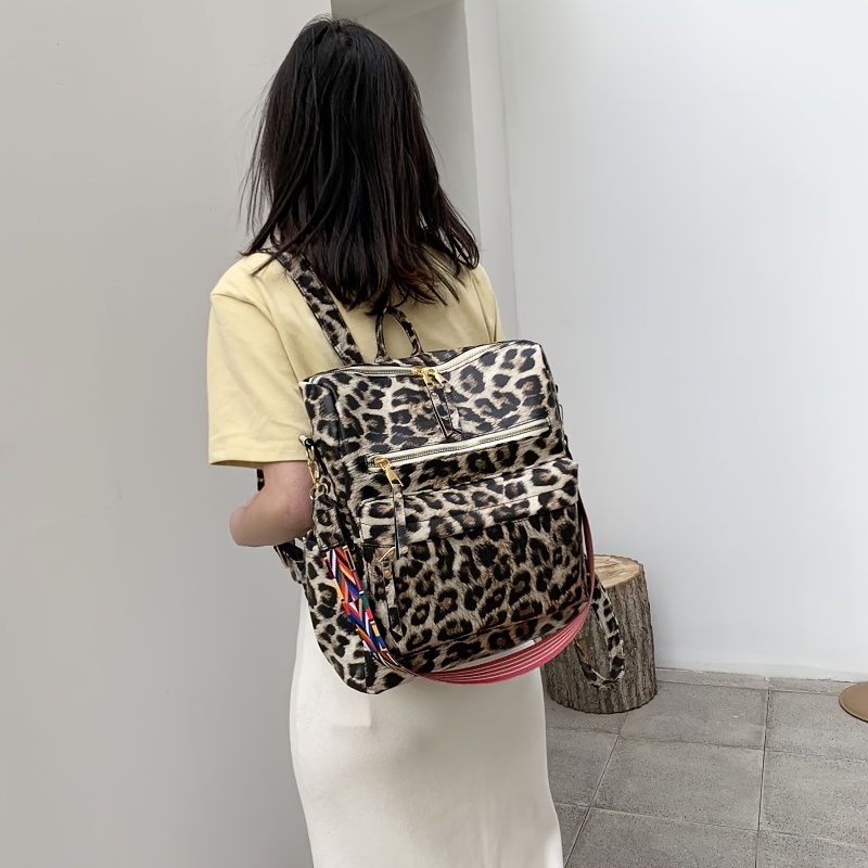 Leopard purse online backpack