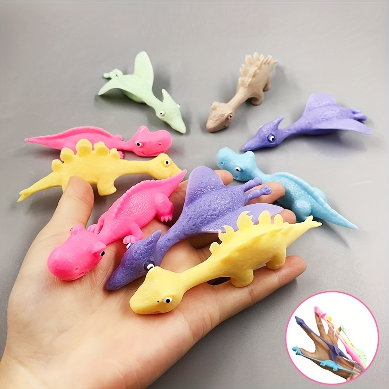 Lot de 20 jouets à doigts en forme de dinosaure volant en caoutchouc pour  enfants, mini fronde en caoutchouc pour lance-pierre (20 pièces, A)
