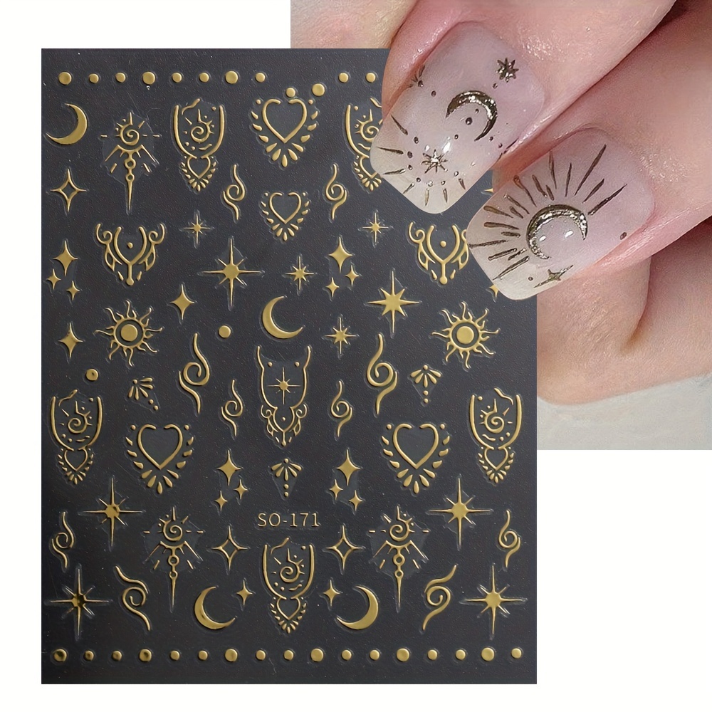 Gold moon and stars nail tattoos