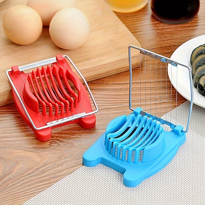 Household device for slicing eggs. Hard-boiled eggs slicer tool