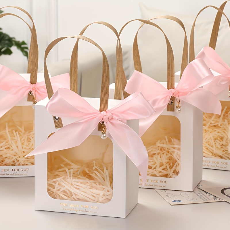 Premium Photo  Small gift box with bow and pink ribbon for gift