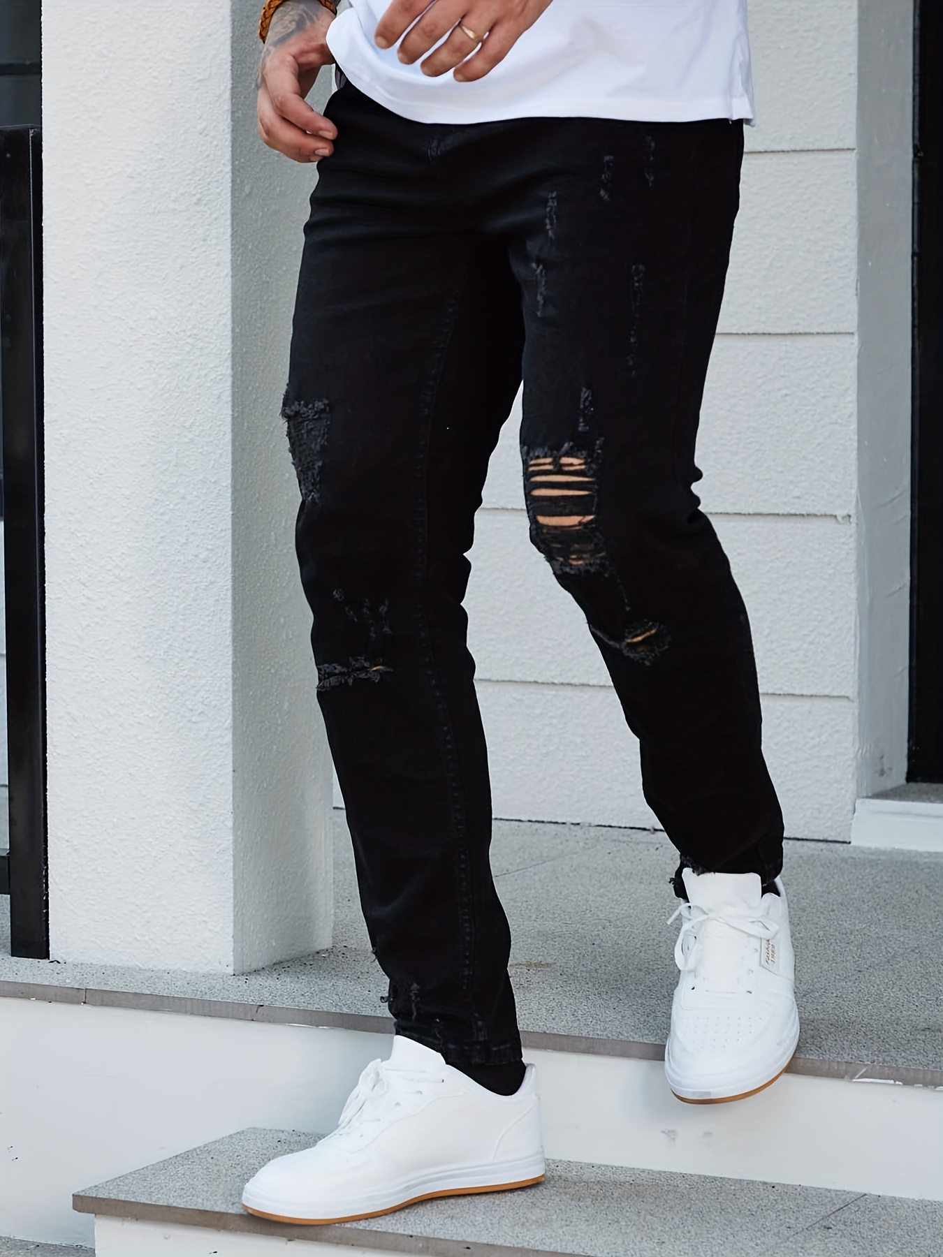 Men's black hole store jeans