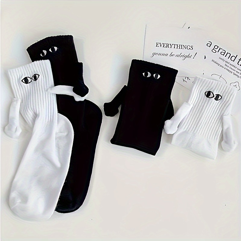 Calcetines de media pantorrilla con ojos de dibujos animados en blanco y  negro para pareja, medias magnéticas creativas, a la moda y divertidas, 1  par - AliExpress