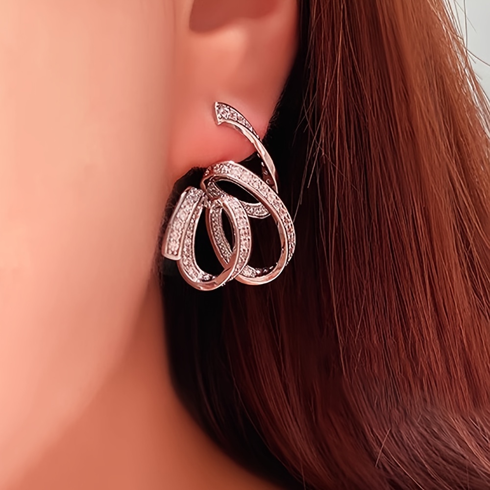 Image of A Creative Ribbon-wrapped Design, Sparkling Zirconia Earrings For Ladies, Perfect For Weddings, Engagements, Parties, And Valentine's Day Gifts.