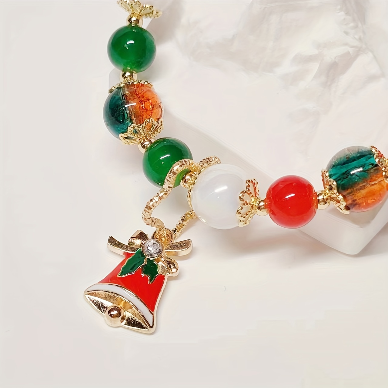 Jingle Bell Bracelet with red, green and silver seed beads. Gold