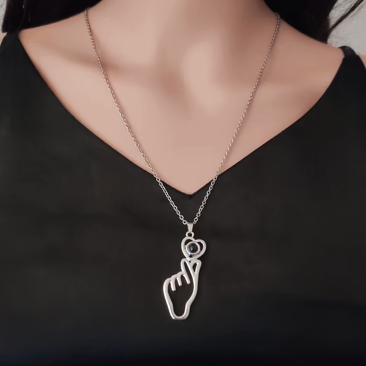 projection hand holding heart pendant say 100 Temu