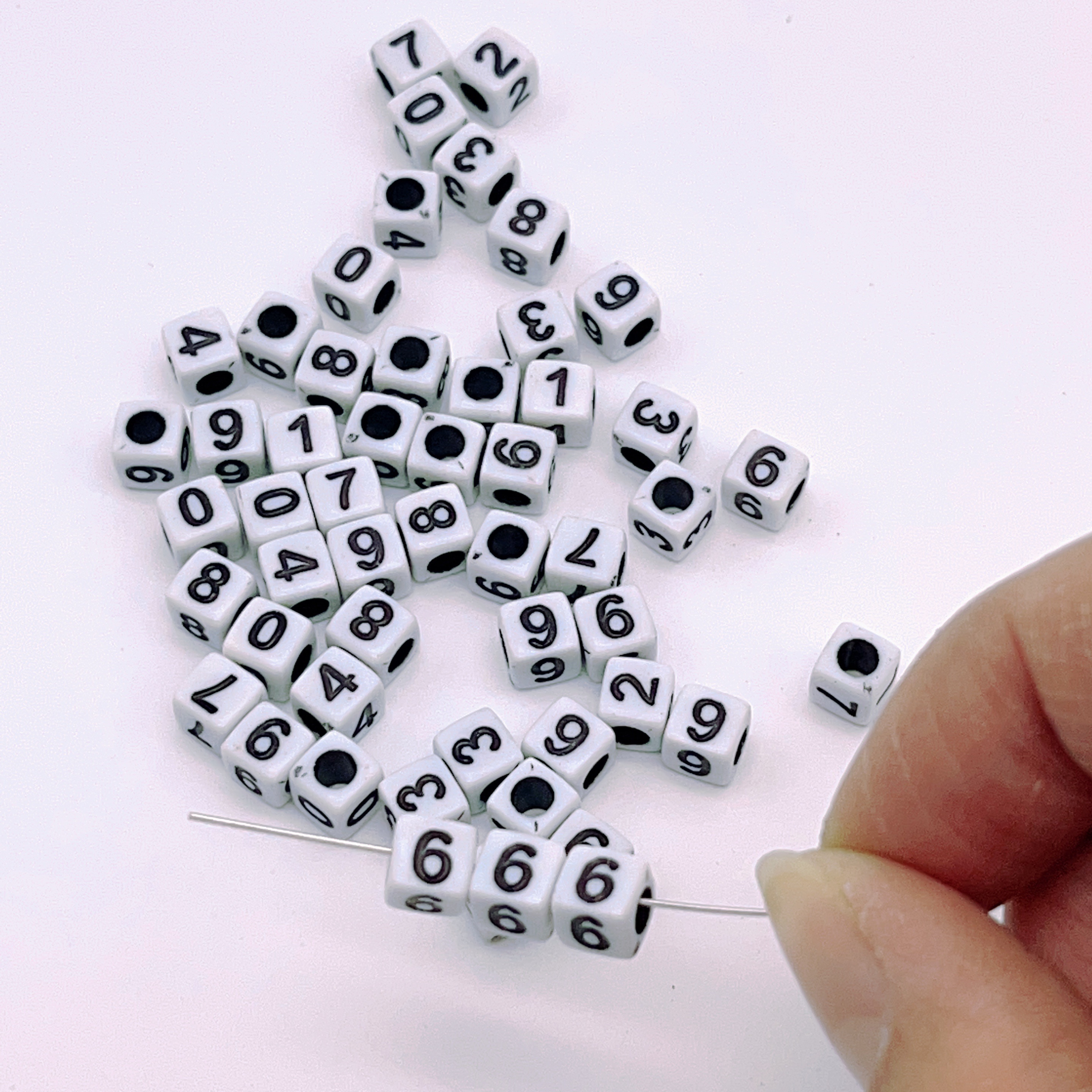 Phone number bracelet - Black numbers on white beads