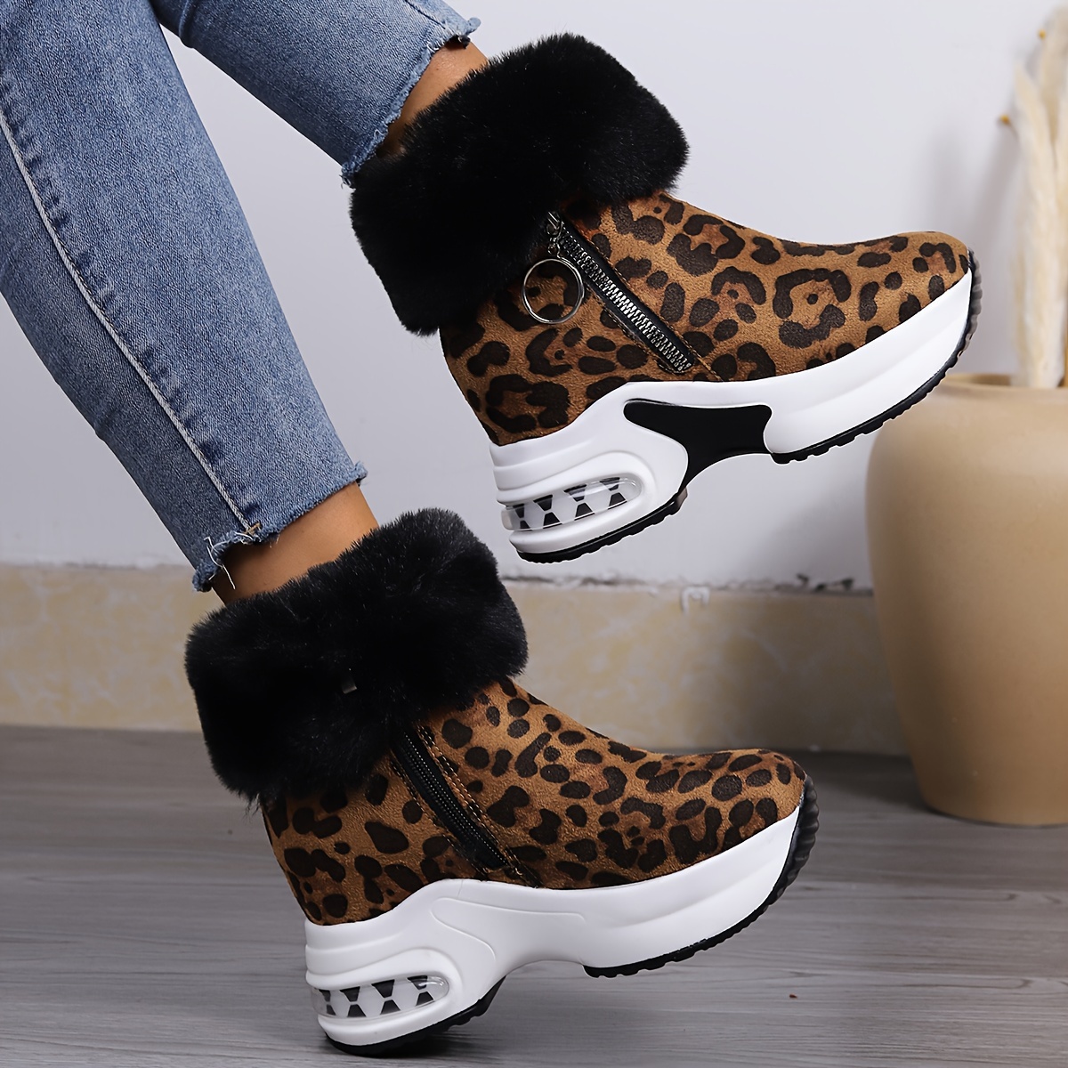 Botas de mujer en pelo con estampado de leopardo