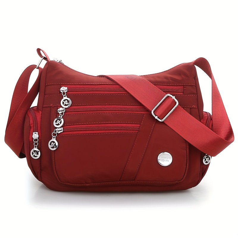 Multi compartment crossbody deals bag