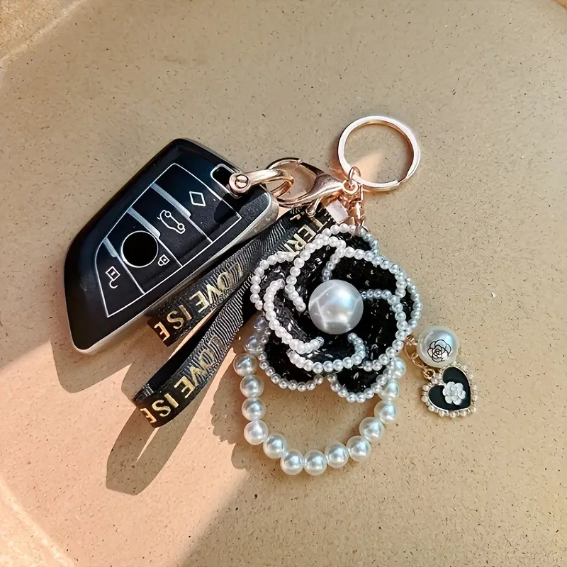chanel gold and silver chain bag charm