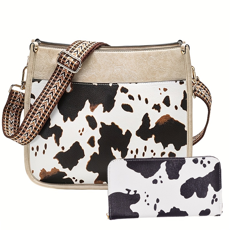 Cow shop print clutch