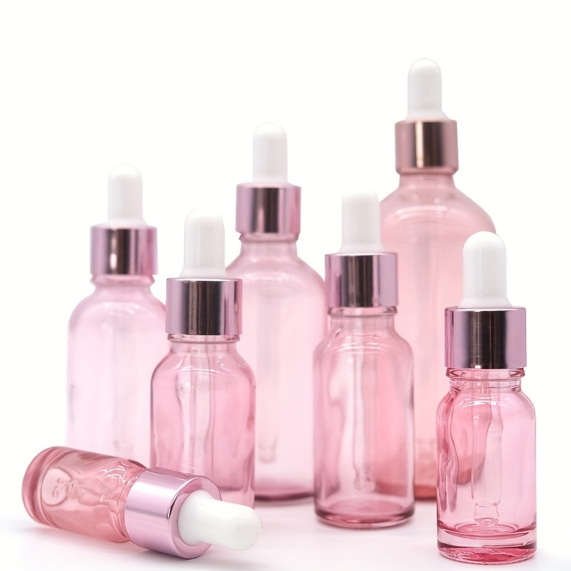 

Pink Essential Oil Bottles With White Droppers, Glass Dropper Bottles In Varying Sizes Refillable Cosmetic Containers Liquids & Serums