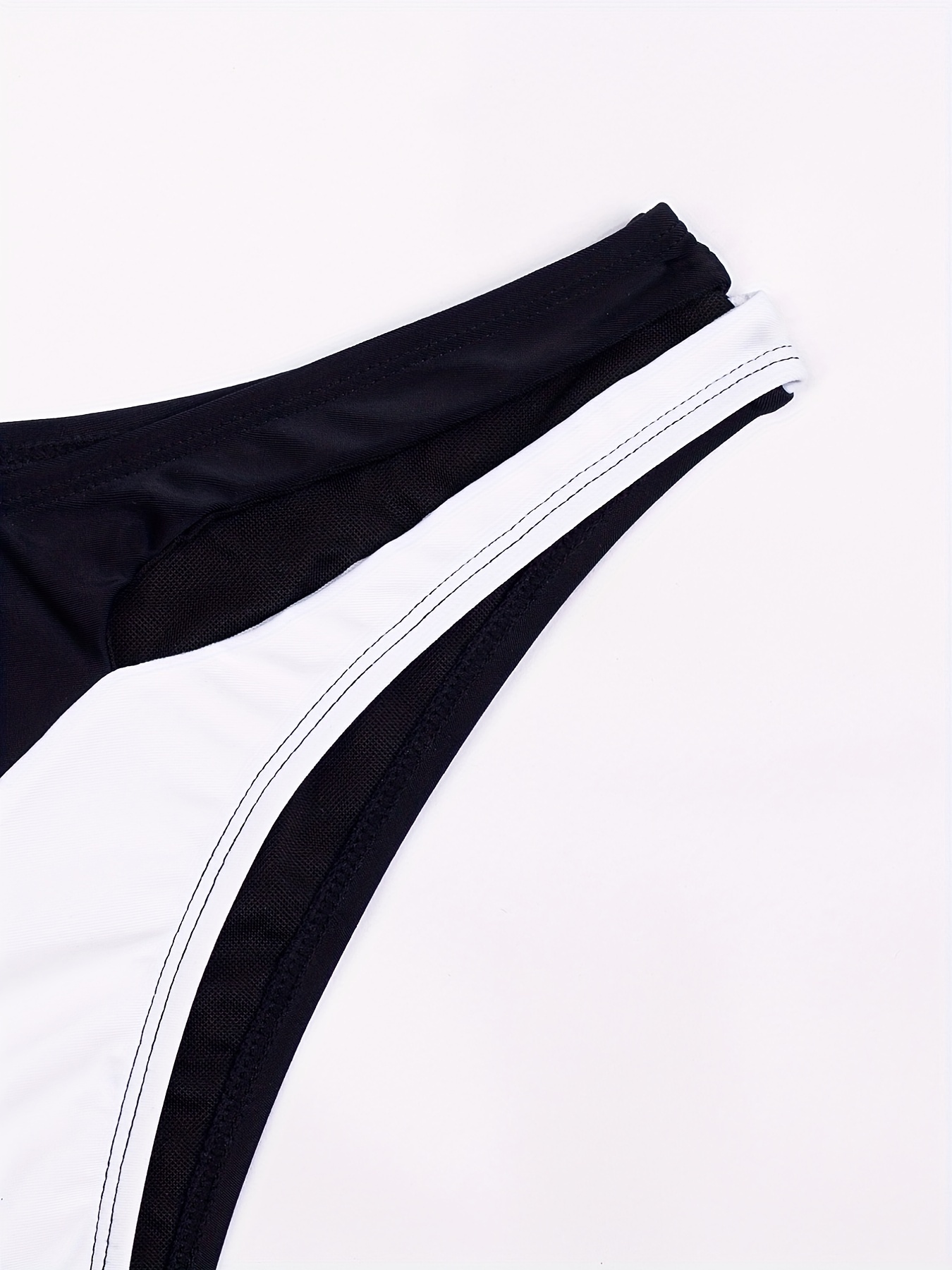 Asymmetric Twist Hollow Out Swim Briefs, Black & White Color Block High Strech Sexy Bikini Bottoms, Women's Swimwear & Clothing