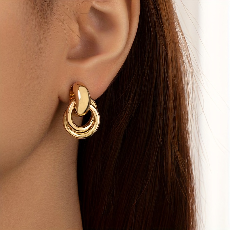 Stylish Golden Earrings for Unique Woman