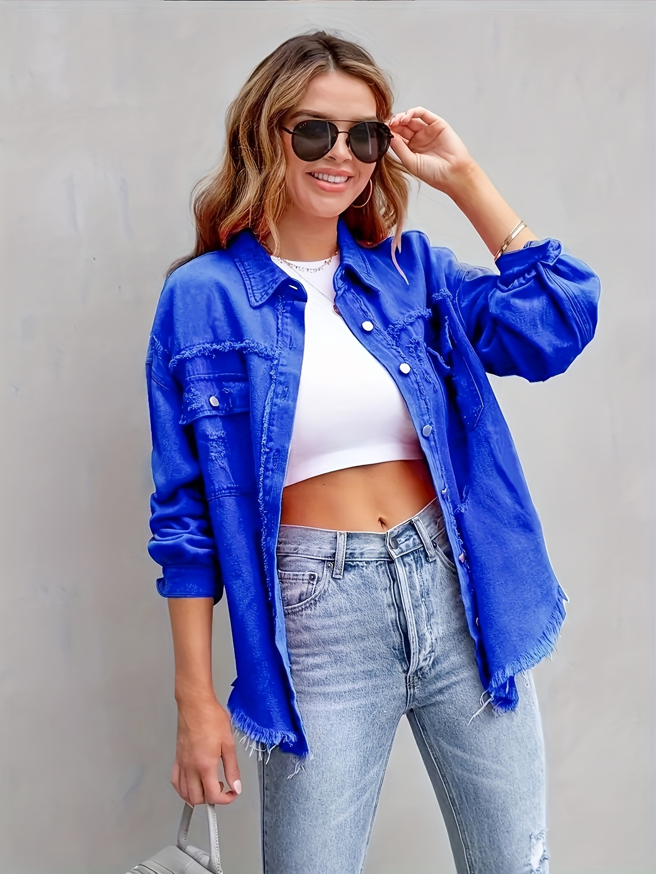 Veste courte en jeans bleue à trous