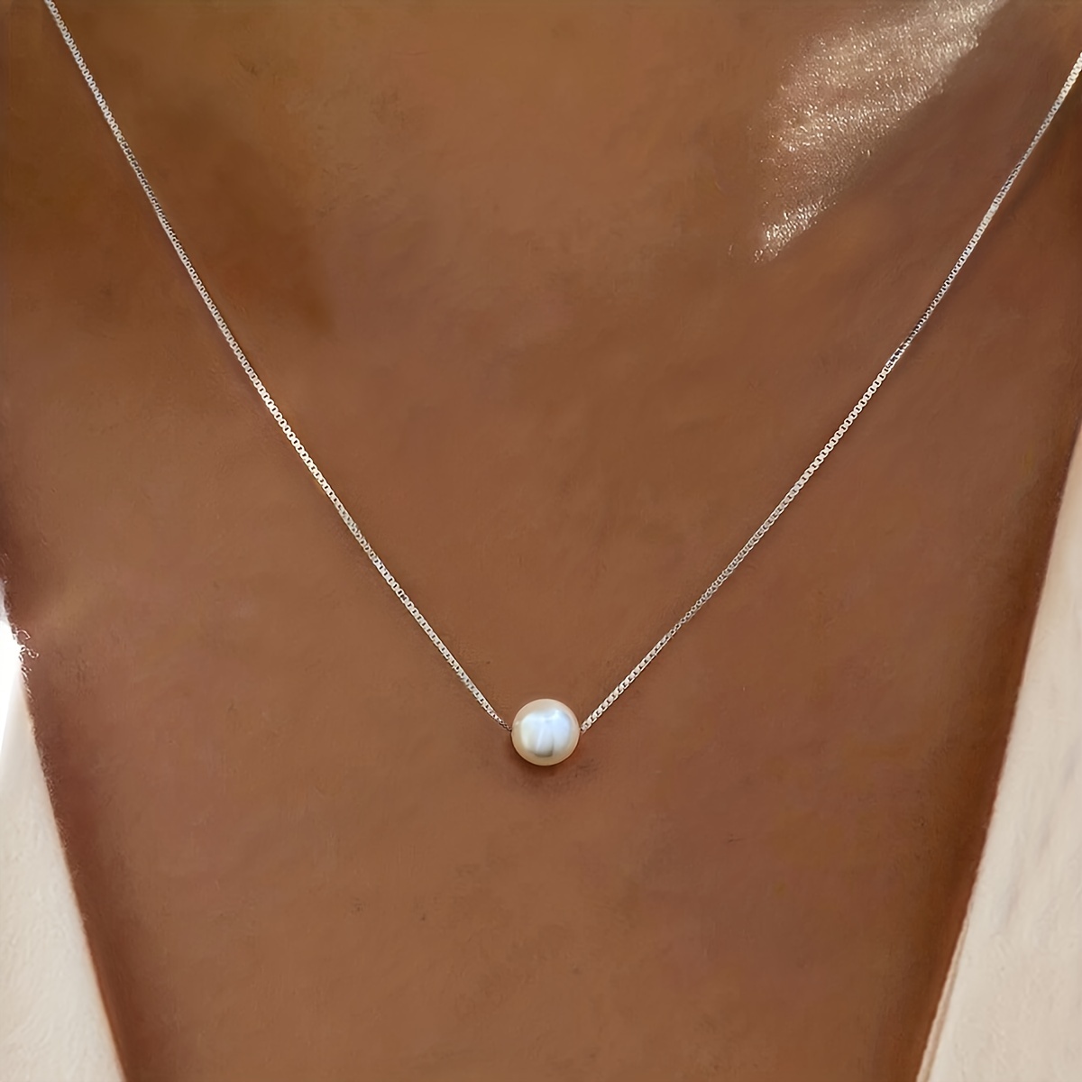 Sterling silver floating pearl on sale necklace