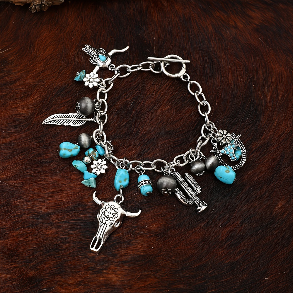 Charm bracelet, beads of imitated turquoise & silver