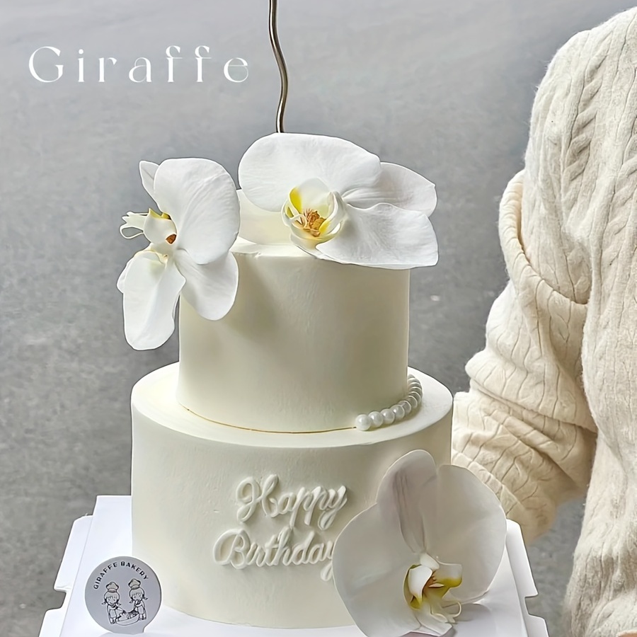 Orchid moth cake for my mom - Decorated Cake by mamadu - CakesDecor