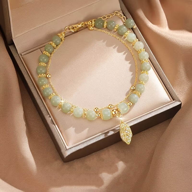 Golden Tone Leaf Charm Bracelet with Green Beads