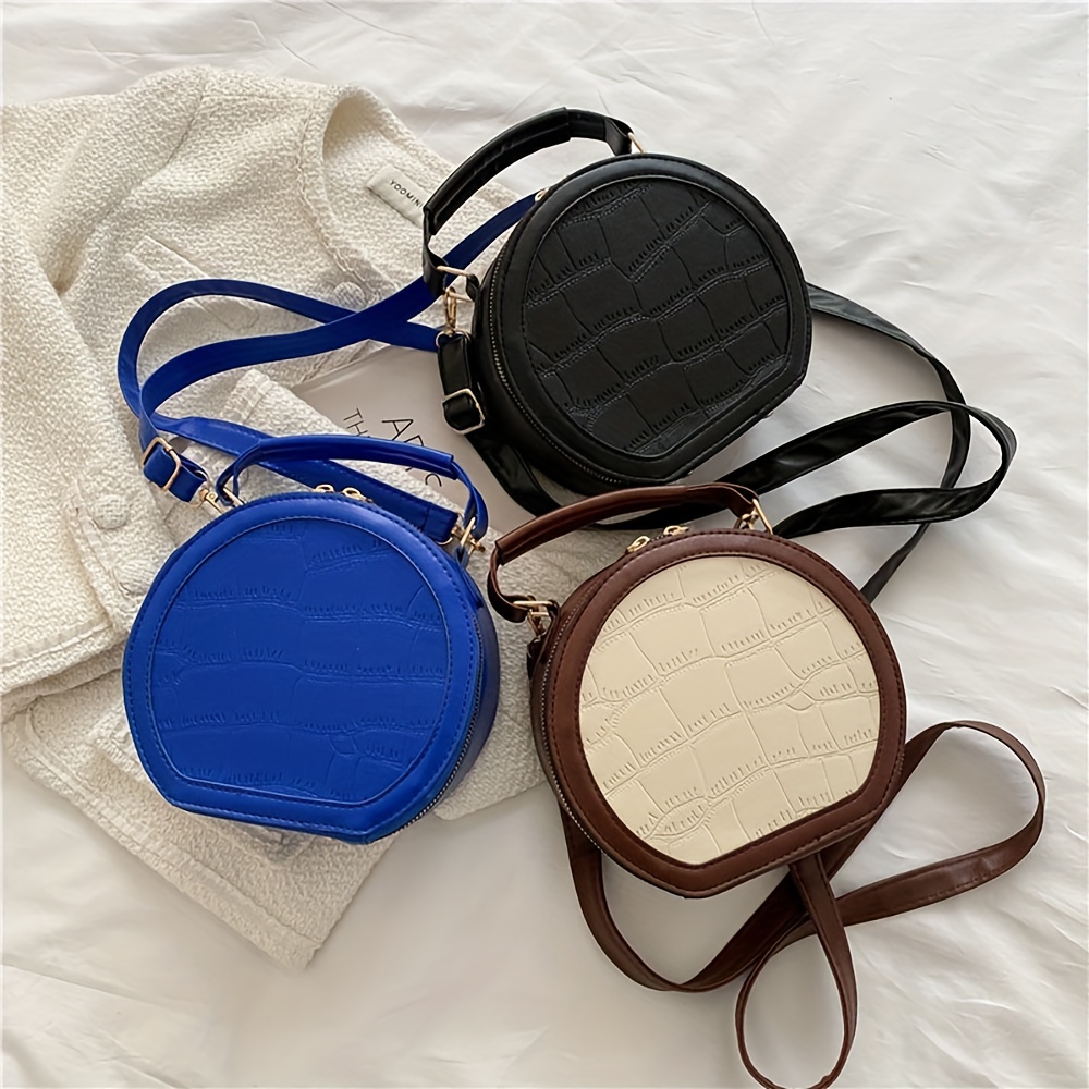 Embossed Circle Crossbody