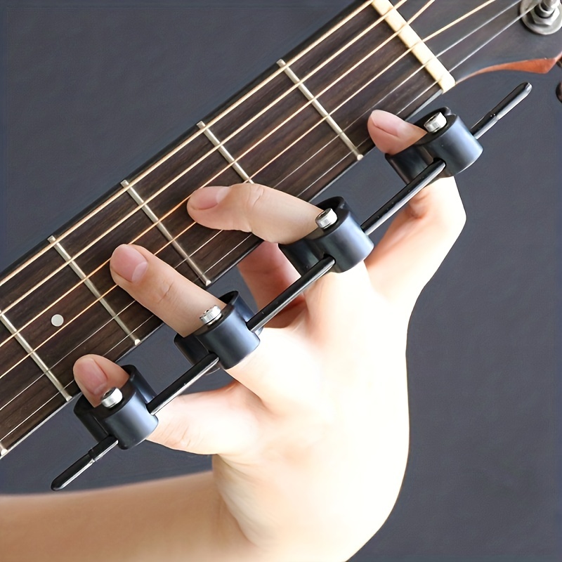 

1pc Adjustable Musical Instrument Finger Expander For Guitar And Piano Practice - Improve Finger Strength And Flexibility