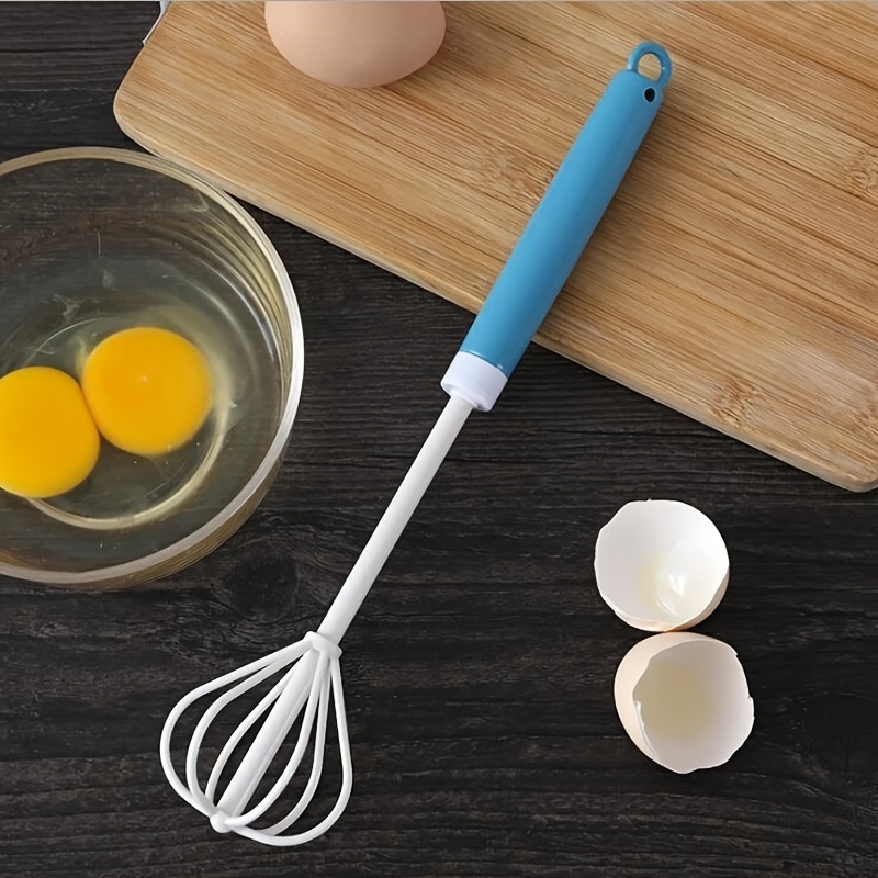 Hand Pressure Rotating Whisk