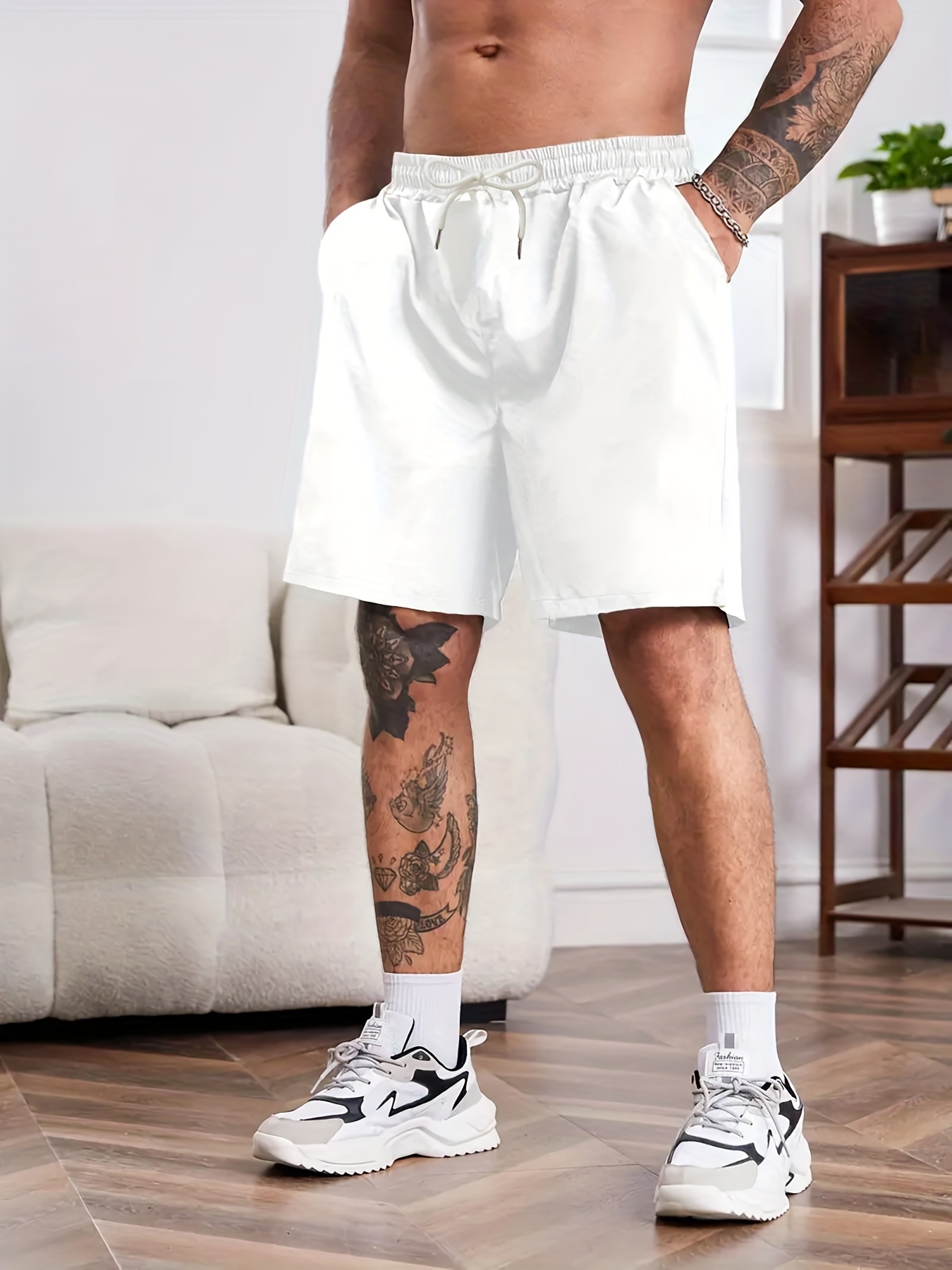  Pantalones cortos blancos de los hombres de los