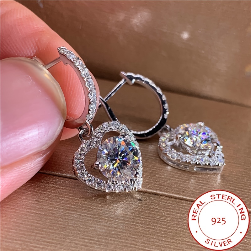 

Elegant Heart-shaped Earrings Made Of 925 Sterling Silver With Hearts And Arrows Zirconia, Weighing Approximately 4.5 Grams, For Women.