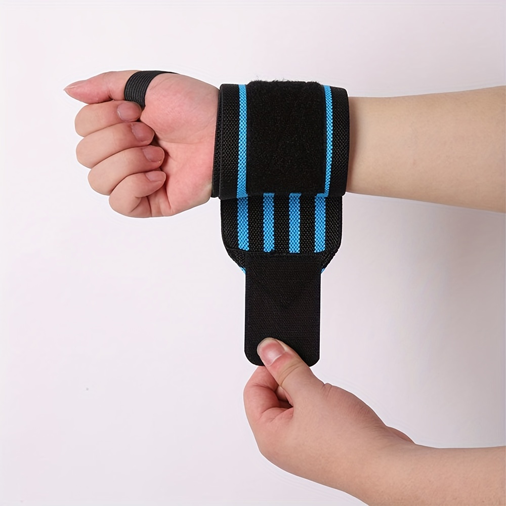 Une paire de ceinture de protection de poignet sport de compression de  poignet pour enfants (noir)