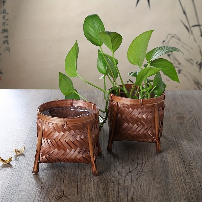 Soporte de plantas tejido con patas, maceta decorativa de madera con cesta  de bambú tejida a