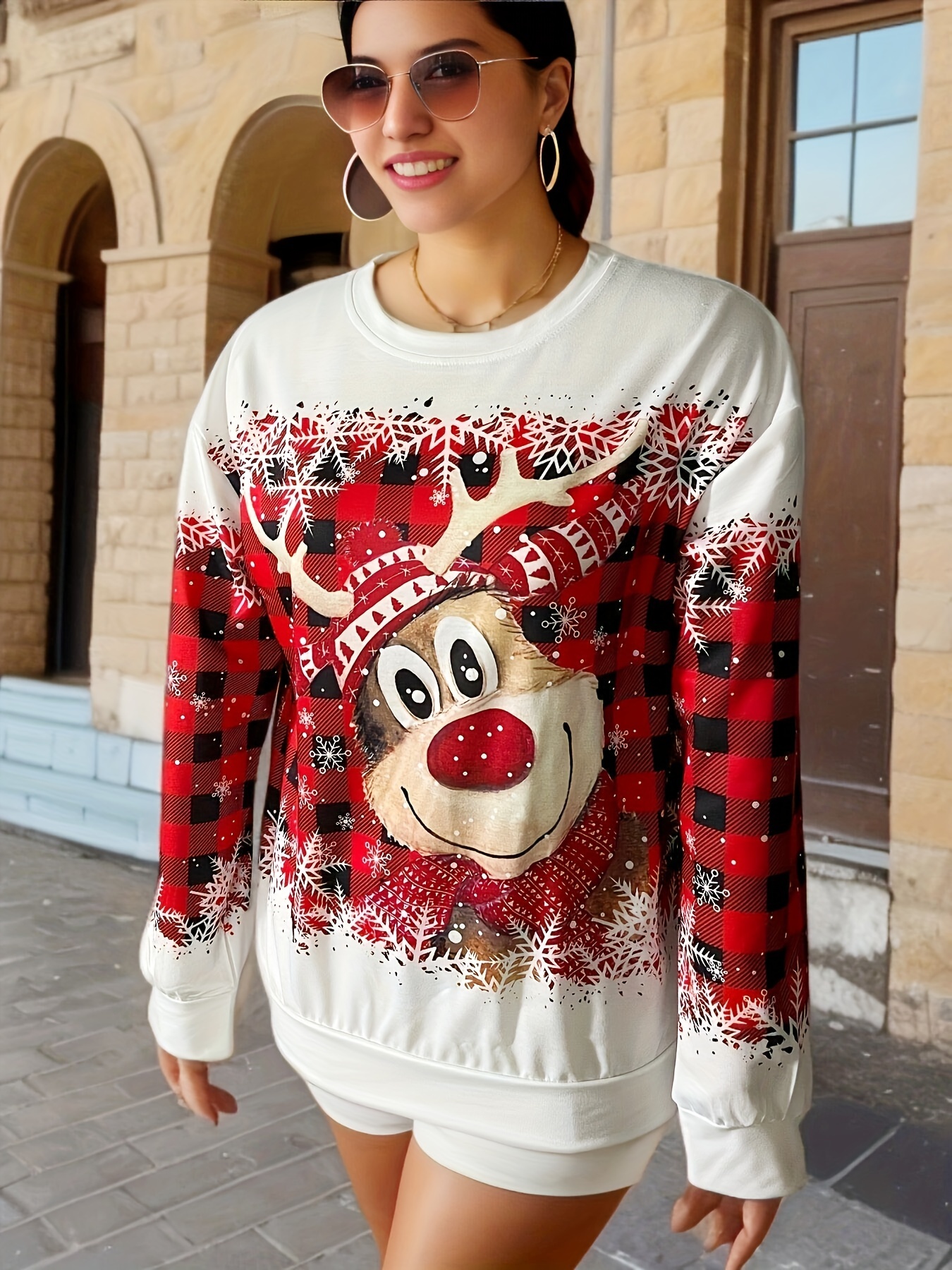 Reindeer print sweater online