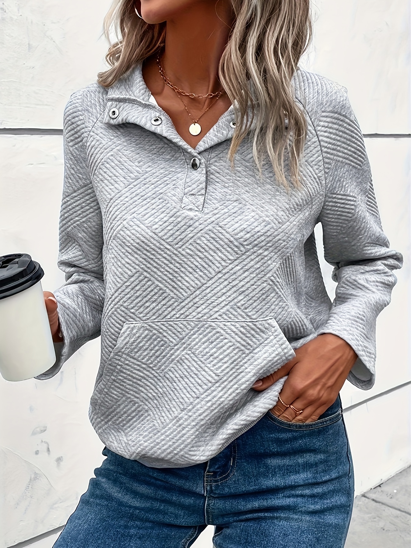 sweatshirt with buttons in the front