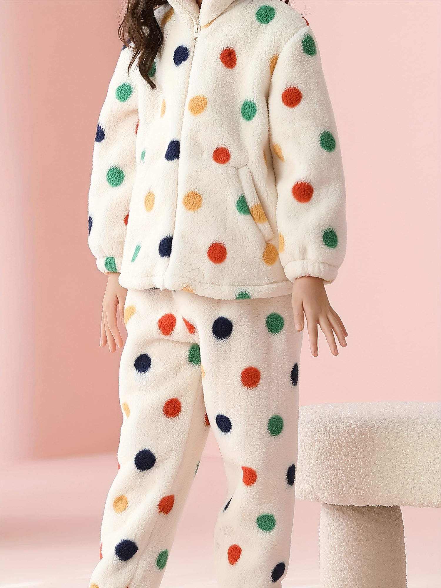 Long multicoloured pyjamas in faux shearling and fleece.