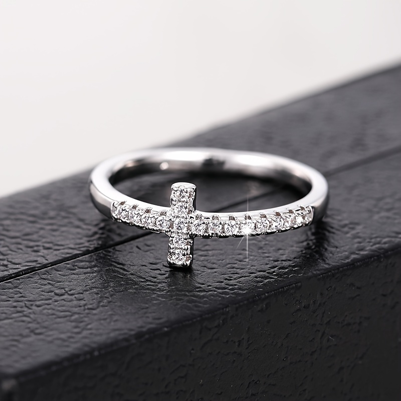 A Stylish And Minimalist Cross Ring for Women Featuring Micro-Set Zirconia Stones Perfect for Daily Wear Casual Parties Engagements Weddings And As a Commitment Gift