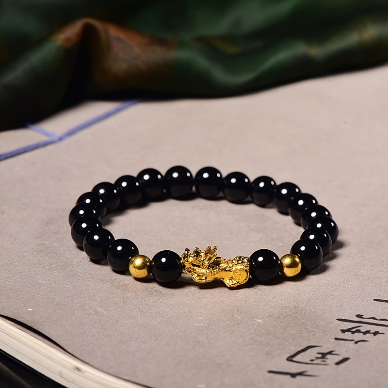 Black and deals gold dragon bracelet