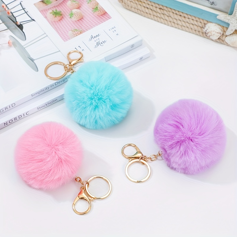 Buy 3 for | Purple Unicorn Puff Ball Keychain White