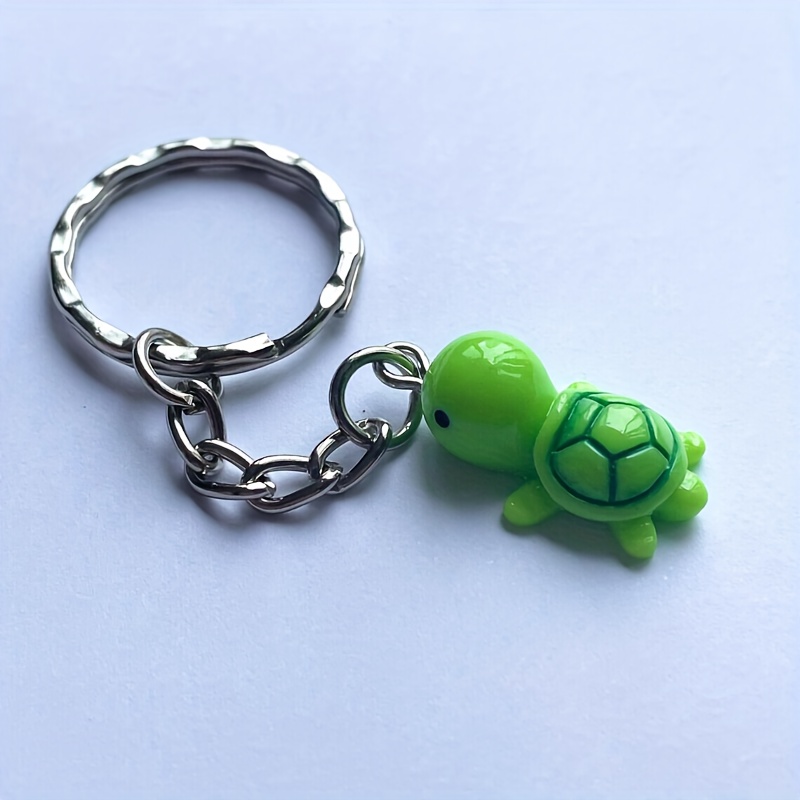 Porte-clés en forme de tortue de mer en métal  Accessoires décoratifs en  forme de tortue pour filles et garçons -ca, A+janvier, 1 : : Mode