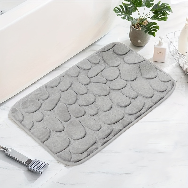 Esta alfombra de baño inteligente con lector de huellas de pies