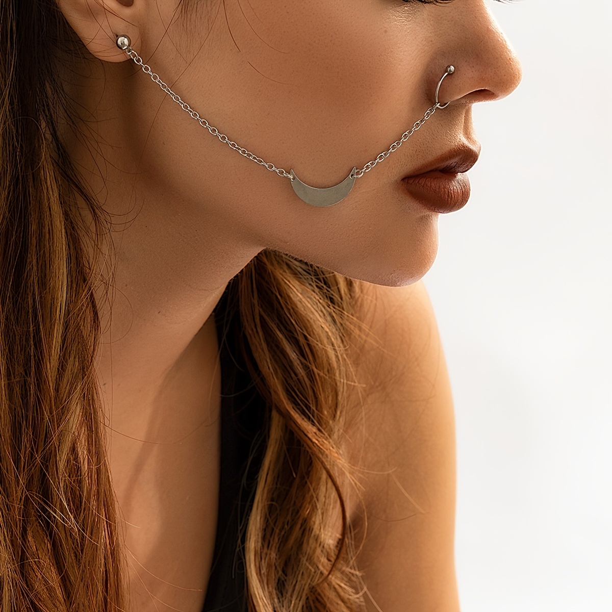 Nose ring connected to on sale earring